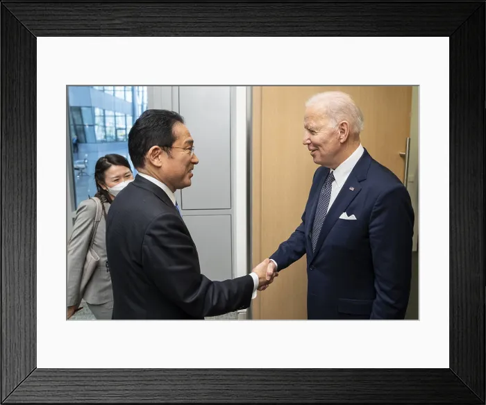 Framed Print : President Joe Biden greets Japanese Prime Minister Fumio Kishida on March 24, 2022. Both were attending an emergency G7 meeting, prompted by Russia's invasion of Ukraine