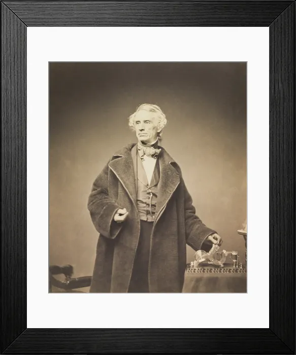 Framed Print : Samuel Morse with His Recorder, 1857. Thirteen years after his 1844 demonstration, sending a message from Baltimore to Washington, he posed with a related invention, the Recorder