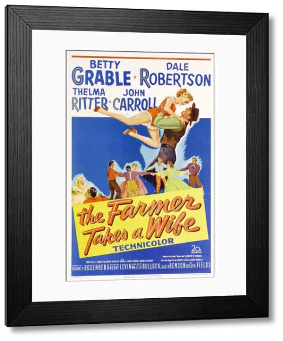 Framed Print : THE FARMER TAKES A WIFE, US poster, face to face from left: Betty Grable, Dale Robertson, 1953. TM & Copyright 20th Century Fox Film Corp. / courtesy Everett Collection Framed Print : THE FARMER TAKES A WIFE, US poster, face to face from left: Betty Grable, Dale Robertson, 1953. TM & Copyright 20th Century Fox Film Corp. / courtesy Everett Collection