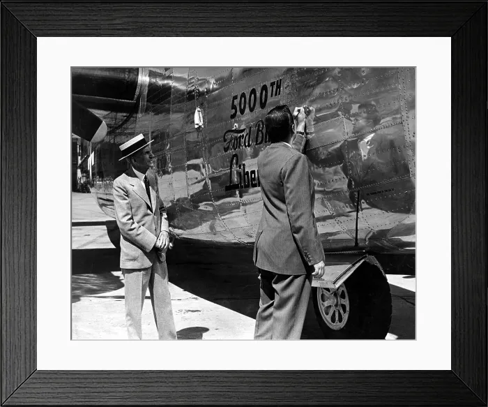 Framed Print : Henry Ford & grandson Henry Ford II, sign 5, 000th Liberator bomber built, 9 / 9 / 44. Courtesy: CSU Archives  /  Everett Collection