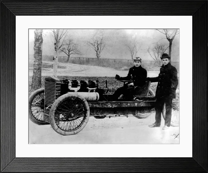 Framed Print : Henry Ford with driver Barney Oldfield in 'Old 99', an early Ford racing car, 1902. Courtesy: CSU Archives  /  Everett Collection