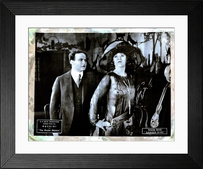 Framed Print : THE MASTER MYSTERY, from left, Harry Houdini, Edna Britton, episode seven, Barbed Wire, 1919