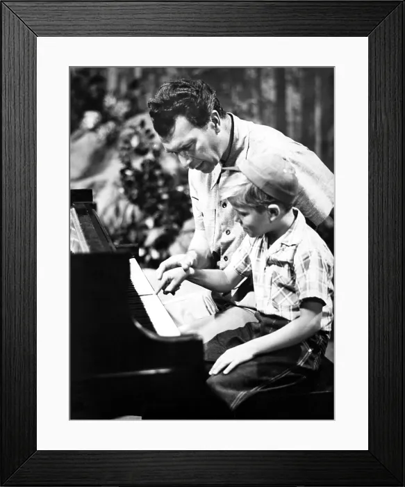 Framed Print : Dave Brubeck and teaching his son to play piano, ca.1950s. Courtesy: CSU Archives  /  Everett Collection