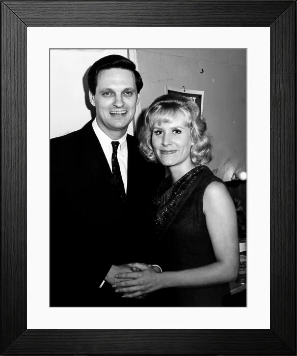Framed Print : Alan Alda and Christina Crawford at the premiere of the play The Midnight Ride of Alvin Blum at the Westport Country Playhouse in Westport, Connecticut