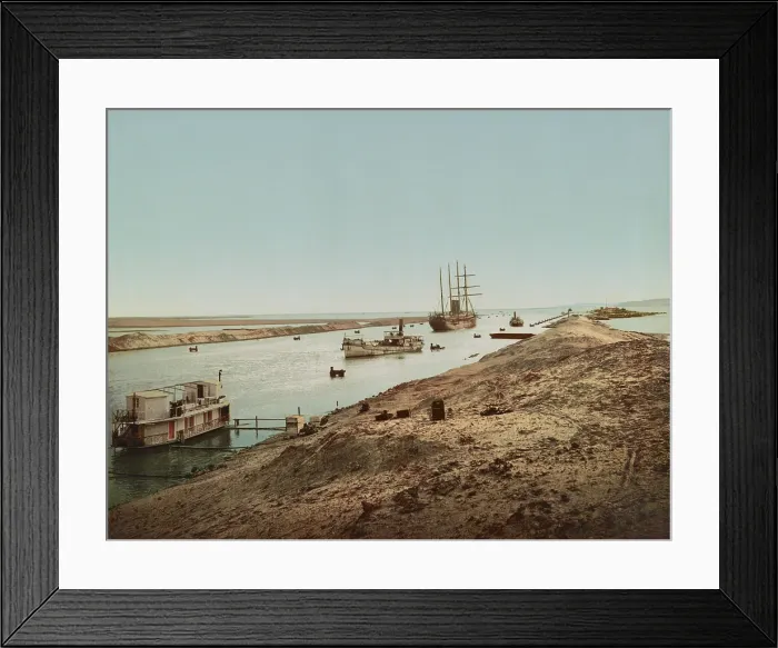 Framed Print : Suez Canal at the entrance to the Great Bitter Lake and Little Bitter Lake, c. 1900. The salt water lakes moderated the effect of the tides on the sea level canal (BSLOC_2018_4_7) Framed Print : Suez Canal at the entrance to the Great Bitter Lake and Little Bitter Lake, c. 1900. The salt water lakes moderated the effect of the tides on the sea level canal (BSLOC_2018_4_7)
