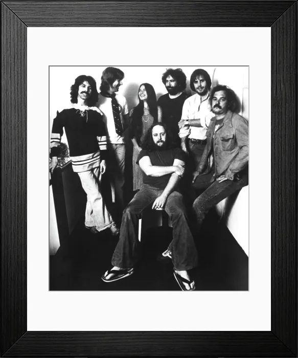 Framed Print : Grateful Dead, (left to right) Mickey Hart, Phil Lesh, Donna Godchaux, Keith Godchaux (seated), Jerry Garcia, Bob Weir, Bill Kreutzman, ca. 1970s