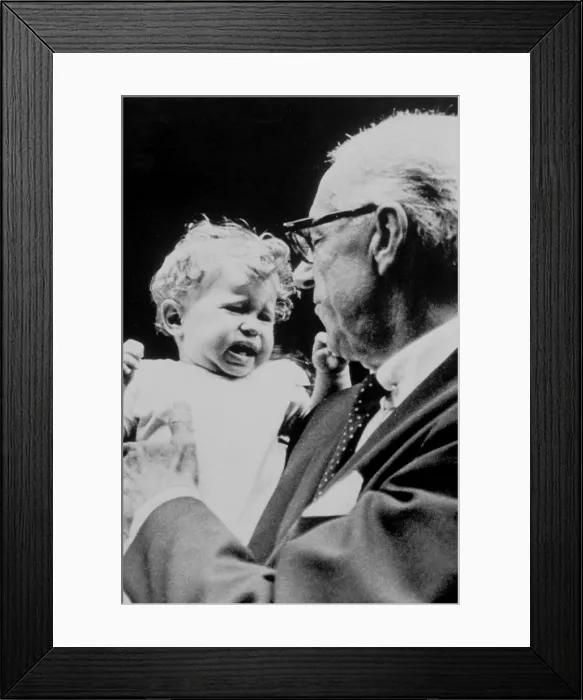 Framed Print : DR.BENJAMIN SPOCK and crying baby, 1968. Courtesy: CSU Archives  /  Everett Collection