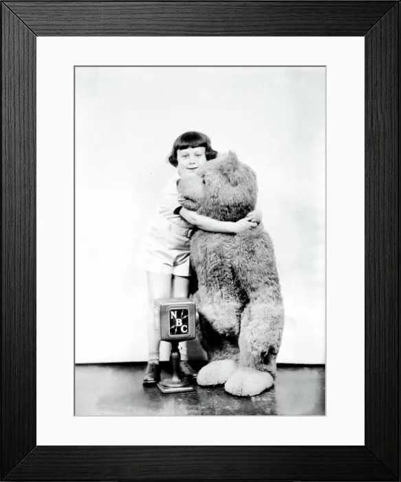 Framed Print : Christopher Robin Milne with the original Winnie the Pooh, 1920s. Courtesy: CSU Archives  /  Everett Collection