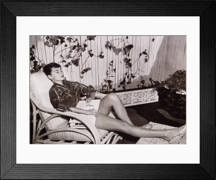 Framed Print : Audrey Hepburn resting with a script in her lap, 1954. Courtesy: CSU Archives  /  Everett Collection
