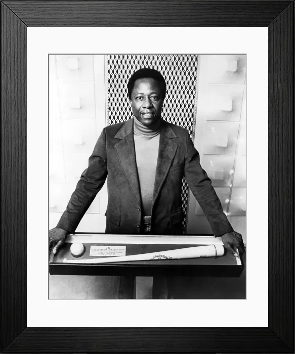 Framed Print : Hank Aaron poses with bat and ball used in hitting record breaking 715th career home run. Photo dated: 06-18-1975.. Courtesy: CSU Archives / Everett Collection Framed Print : Hank Aaron poses with bat and ball used in hitting record breaking 715th career home run. Photo dated: 06-18-1975.. Courtesy: CSU Archives / Everett Collection