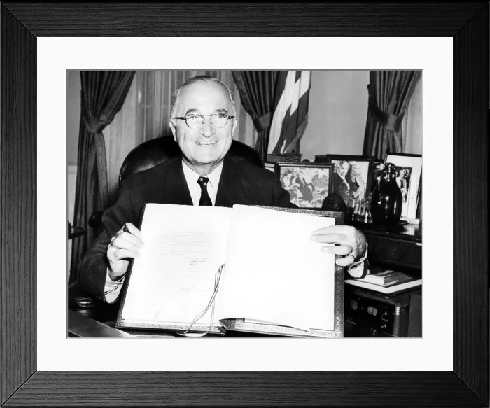Framed Print : PRESIDENT HARRY TRUMAN holds up the Japanese peace treaty he signed into ratification, 4 / 15 / 52.. Courtesy: CSU Archives  /  Everett Collection