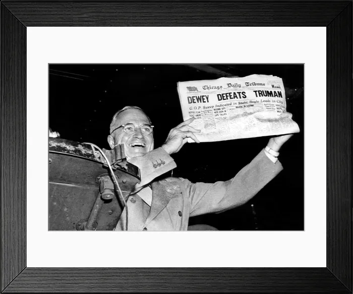 Framed Print : EV1811 - Harry Truman holds up headline that declared Dewey the winner prematurely after Truman won the election, November 1948. Courtesy: CSU Archives  /  Everett Collection
