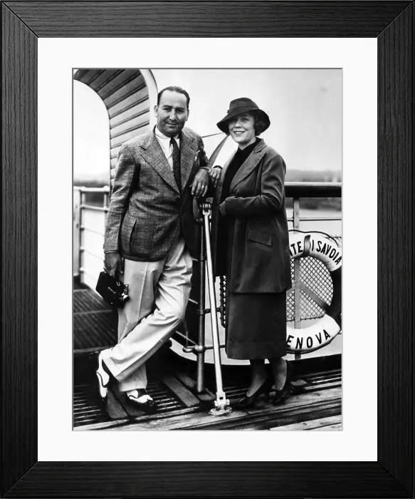 Framed Print : American movie producer Hal Wallis and his wife Louise Fazenda, aboard the S.S. Conte Di Savoia after its arrival in New York City, June 11, 1936
