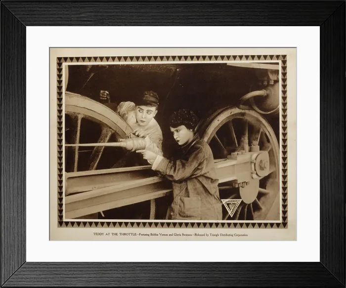 Framed Print : TEDDY AT THE THROTTLE, lobbycard, from left: Bobby Vernon, Gloria Swanson, 1917
