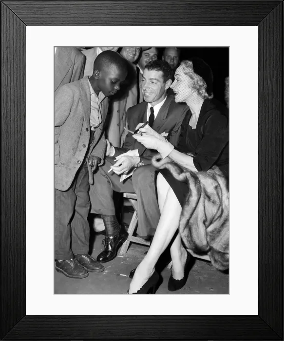Framed Print : A young fan gets the autographs of Joe DiMaggio and Marlene Dietrich at a Sugar Ray Robinson fight in New York, 1951. Courtesy: CSU Archives / Everett Collection Framed Print : A young fan gets the autographs of Joe DiMaggio and Marlene Dietrich at a Sugar Ray Robinson fight in New York, 1951. Courtesy: CSU Archives / Everett Collection