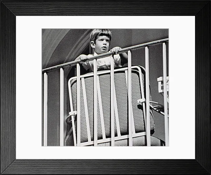 Framed Print : JOHN F. KENNEDY Jr. watches a ceremony from a balcony at the White House, 1963. Courtesy: CSU Archives  /  Everett Collection