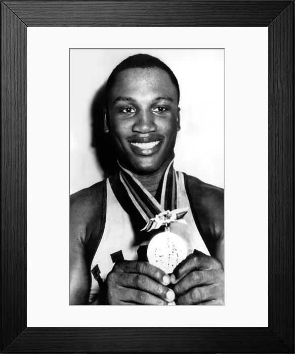Framed Print : Joe Frazier holding Olympic heavyweight gold medal, Tokyo, 10 / 23 / 1964. Courtesy: CSU Archives / Everett Collection Framed Print : Joe Frazier holding Olympic heavyweight gold medal, Tokyo, 10 / 23 / 1964. Courtesy: CSU Archives / Everett Collection
