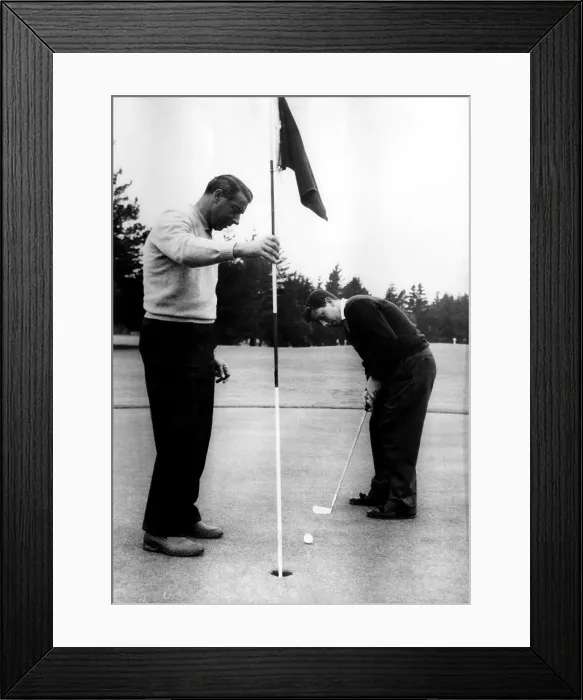 Framed Print : Joe DiMaggio and his son, Joe Jr. play golf in San Francisco, 1956. Courtesy: CSU Archives / Everett Collection