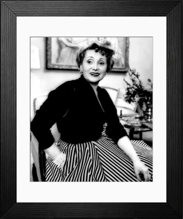 Framed Print : Jolie Gabor, mother of Zsa Zsa and Ava, sits in her living room, New York, New York. 1952. Courtesy: CSU Archives / Everett Collection