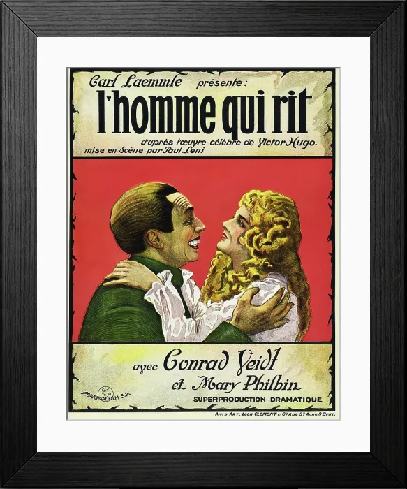 Framed Print : THE MAN WHO LAUGHS, (aka L'HOMME QUI RIT), l-r: Conrad Veidt, Mary Philbin on Belgian poster art, 1928 Framed Print : THE MAN WHO LAUGHS, (aka L'HOMME QUI RIT), l-r: Conrad Veidt, Mary Philbin on Belgian poster art, 1928