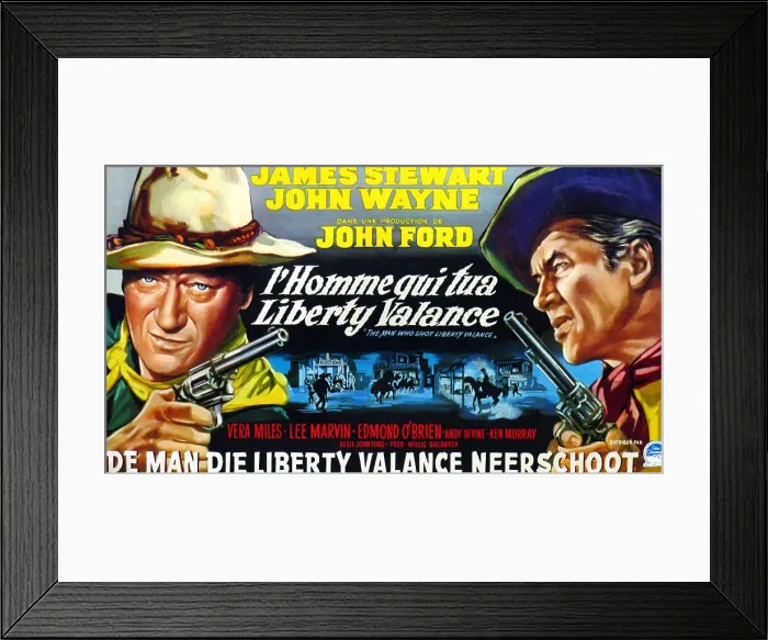 Framed Print : THE MAN WHO SHOT LIBERTY VALANCE, (aka L'HOMME QUI TUA LIBERTY VALANCE), l-r: John Wayne, James Stewart on Belgian poster art, 1962 Framed Print : THE MAN WHO SHOT LIBERTY VALANCE, (aka L'HOMME QUI TUA LIBERTY VALANCE), l-r: John Wayne, James Stewart on Belgian poster art, 1962