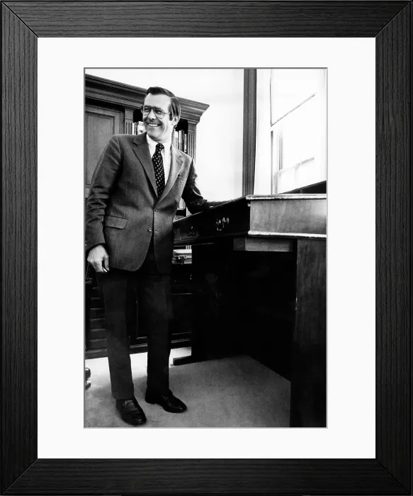 Framed Print : Donald Rumsfeld, White House Chief of Staff, at his stand-up desk, November 5, 1975. Courtesy: CSU Archives / Everett Collection
