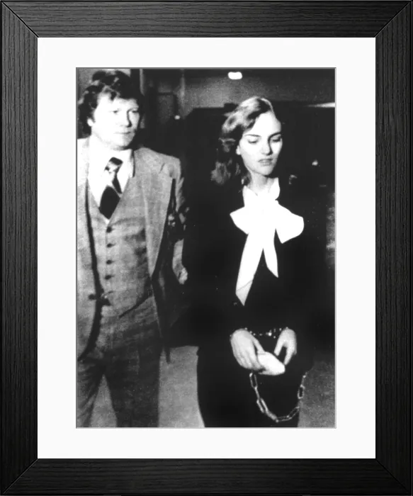 Framed Print : Patricia Hearst being escorted during her trial in San Francisco, CA, 1976.. Courtesy: CSU Archives  /  Everett Collection