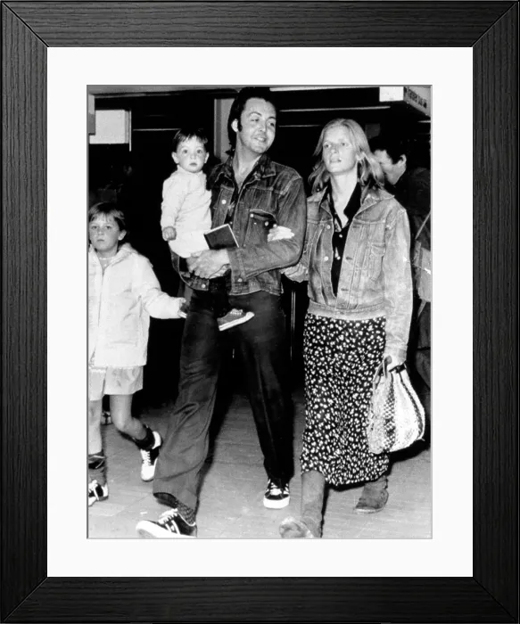 Framed Print : Paul and Linda McCartney with children Heather and Mary at airport, 1971 Framed Print : Paul and Linda McCartney with children Heather and Mary at airport, 1971