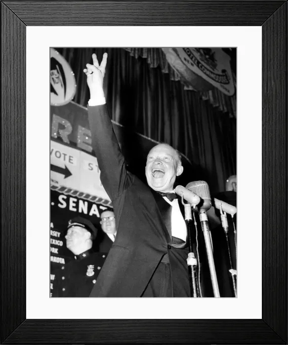 Framed Print : General Dwight D. Eisenhower flashes a victory sign at his Hotel Commodore campaign headquarters after winning the presidential election, November 5, 1952