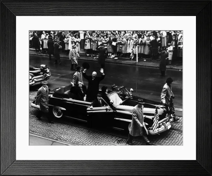 Framed Print : President Dwight D. Eisenhower (c) and his wife wave to the crowd from their car as it goes up 15th Street enroute to the White House. Washington DC. January 21, 1957 Framed Print : President Dwight D. Eisenhower (c) and his wife wave to the crowd from their car as it goes up 15th Street enroute to the White House. Washington DC. January 21, 1957