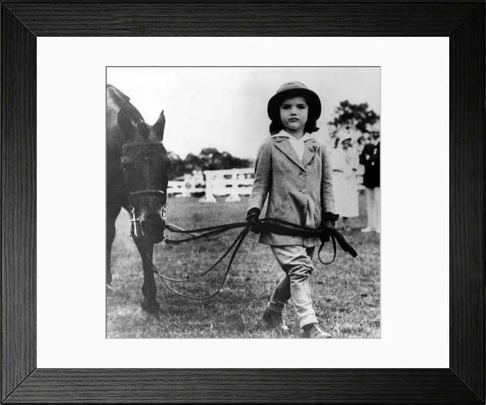 Framed Print : Jacqueline Bouvier age 4, with her pony at a Southampton horse show, ca. 1933. Courtesy: CSU Archives / Everett Collection Framed Print : Jacqueline Bouvier age 4, with her pony at a Southampton horse show, ca. 1933. Courtesy: CSU Archives / Everett Collection