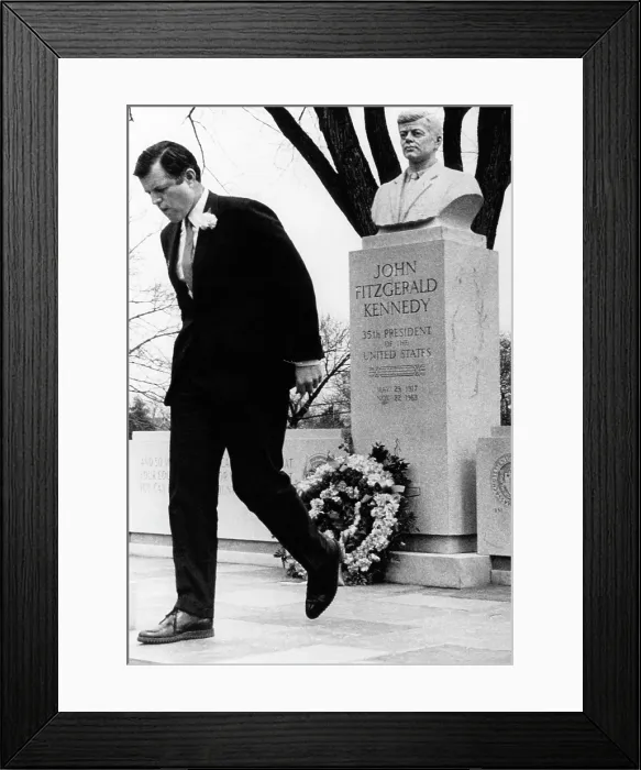 Framed Print : Senator Edward Kennedy, visiting brother John's memorial in Holyoke, Mass. after marching in the St