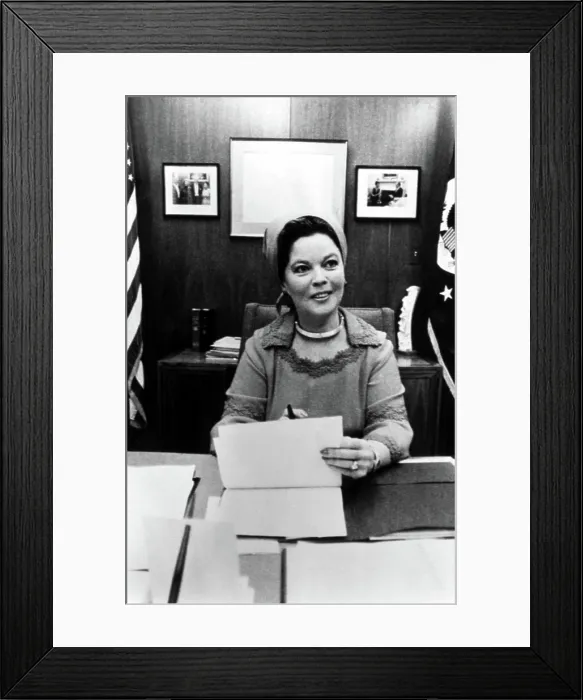 Framed Print : Shirley Temple Black in her office, 1976. Courtesy: CSU Archives / Everett Collection Framed Print : Shirley Temple Black in her office, 1976. Courtesy: CSU Archives / Everett Collection
