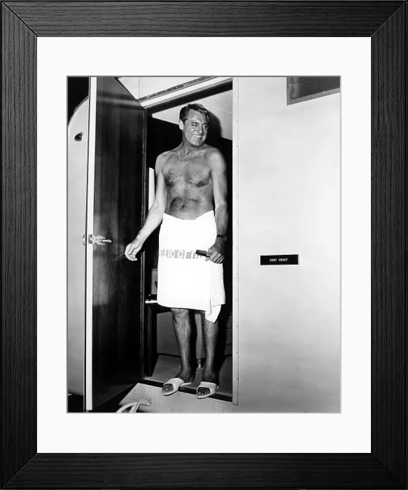 Framed Print : THAT TOUCH OF MINK, Cary Grant comes out of his dressing room while filming, 1962. Courtesy: CSU Archives / Everett Collection Framed Print : THAT TOUCH OF MINK, Cary Grant comes out of his dressing room while filming, 1962. Courtesy: CSU Archives / Everett Collection