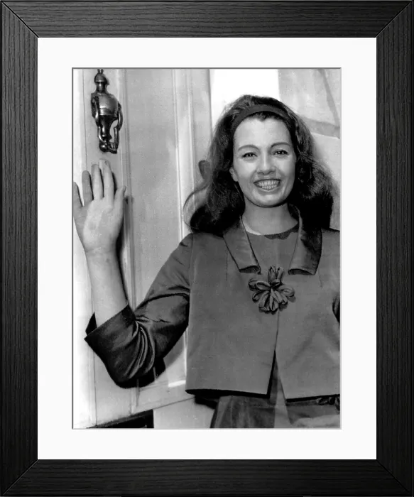 Framed Print : Christine Keeler smiles and waves at her home after her release from prison. June 9, 1964. Courtesy: CSU Archives  /  Everett Collection