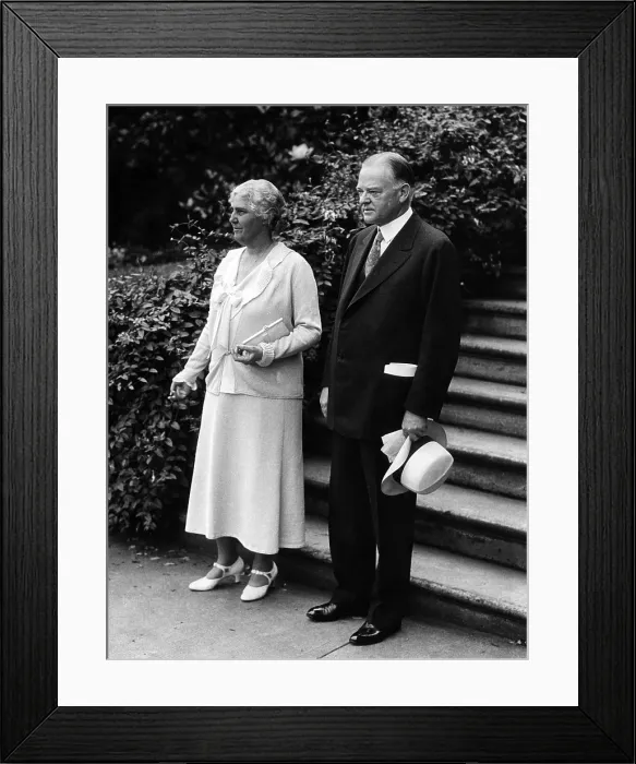 Framed Print : President Herbert Hoover and first lady, Lou Henry Hoover, pose for the annual presidential year photo in the garden of the White House, June 15, 1932