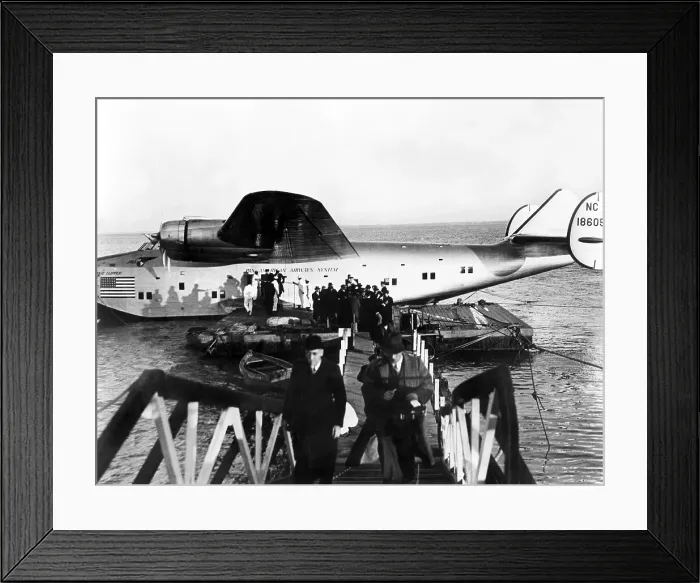 Framed Print : Passengers disembarking the first commercial cross-Atlantic flight, Pan American Airway's, The Dixie Clipper, at Lisbon, Portugal, June 1939 Framed Print : Passengers disembarking the first commercial cross-Atlantic flight, Pan American Airway's, The Dixie Clipper, at Lisbon, Portugal, June 1939