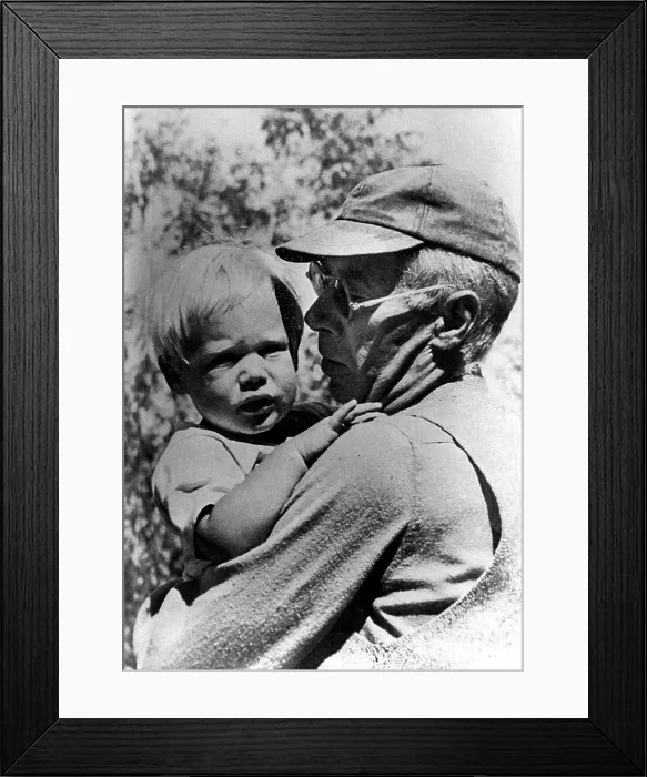 Framed Print : Henry Miller holding his son Tony, circa 1950. Courtesy: CSU Archives / Everett Collection Framed Print : Henry Miller holding his son Tony, circa 1950. Courtesy: CSU Archives / Everett Collection