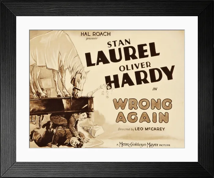 Framed Print : WRONG AGAIN, from top: Stan Laurel, Oliver Hardy on title lobbycard, 1929
