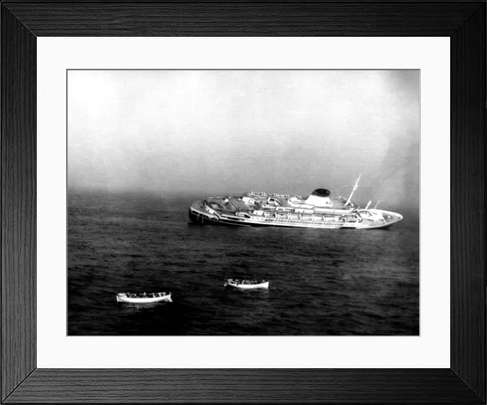Framed Print : ANDREA DORIA, the Italian ocean liner is sinking in the ocean, 60 miles off of Nantucket Island, July 25, 1956, after its collision with the Swedish liner, Stockholm Framed Print : ANDREA DORIA, the Italian ocean liner is sinking in the ocean, 60 miles off of Nantucket Island, July 25, 1956, after its collision with the Swedish liner, Stockholm