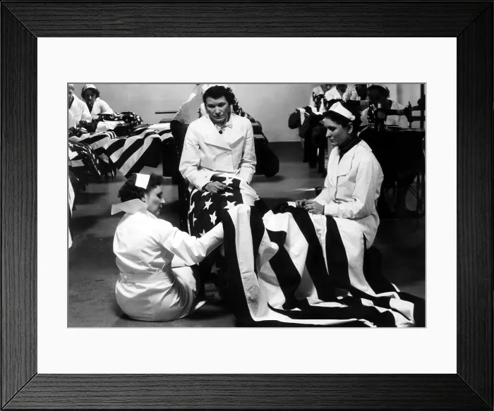 Framed Print : Making an American Flag in a South Dakota WPA sewing room. 1937. Courtesy: CSU Archives / Everett Collection