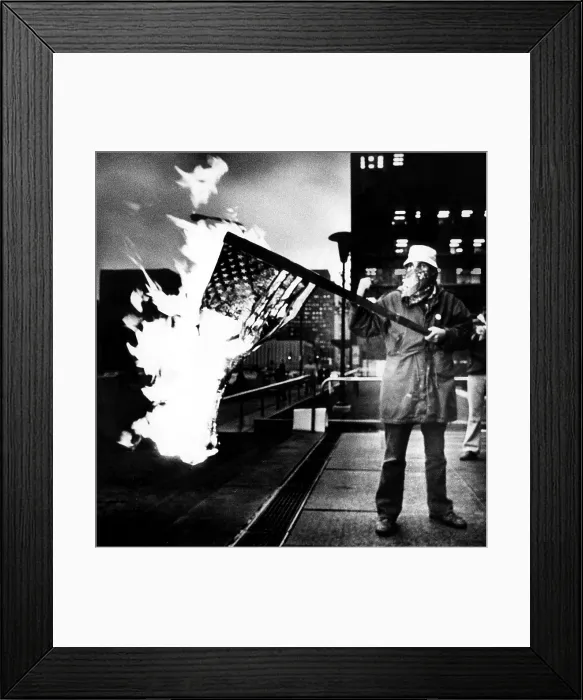 Framed Print : A man burns an American Flag at the Federal Building at a rally in support of Iranian students holding hostages at the US Embassy in Iran. ca