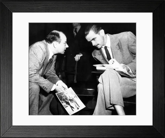 Framed Print : Howard Hughes (right) confers with his counsel, Thomas A. Slack, at the Senate War Investigating sub-committee hearing, 1947. Courtesy: CSU Archives / Everett Collection