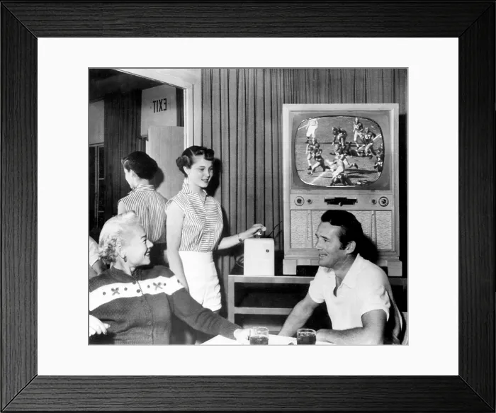 Framed Print : Mrs. Hal Roach Jr. Shari Roach, Howard Duff watch closed circuit broad cast of Notre Dame-Southern California football game at the Palm Springs Racquet Club, 1953 Framed Print : Mrs. Hal Roach Jr. Shari Roach, Howard Duff watch closed circuit broad cast of Notre Dame-Southern California football game at the Palm Springs Racquet Club, 1953