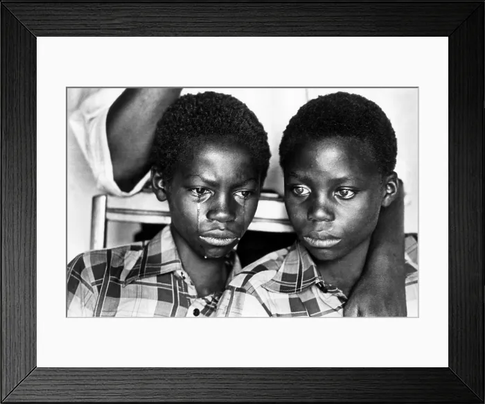 Framed Print : Two young men in South Africa, living under apartheid, by Peter Magubane.. Courtesy: CSU Archives  /  Everett Collection