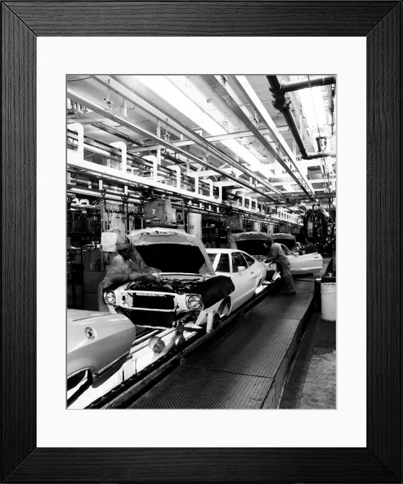Framed Print : Workers assemble Ford Mustangs at the plant in Dearborn, Michigan, 1976. Courtesy: CSU Archives / Everett Collection Framed Print : Workers assemble Ford Mustangs at the plant in Dearborn, Michigan, 1976. Courtesy: CSU Archives / Everett Collection