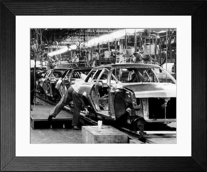 Framed Print : Cars move along the assembly line at the Ford plant in Metuchen, New Jersey, 1975. Courtesy: CSU Archives / Everett Collection