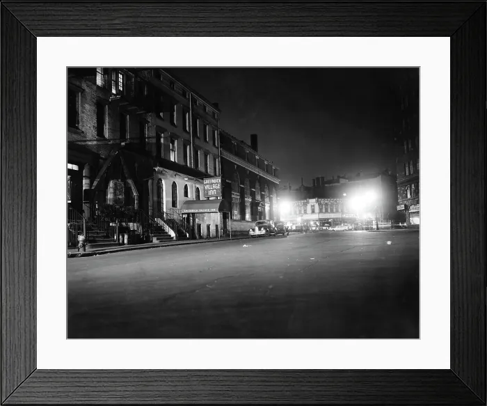 Framed Print : New York City, view of Sheridan Square & the Greenwich Village Inn, during a curfew due to a fuel shortage brought on by a tugboat strike, February 11, 1945