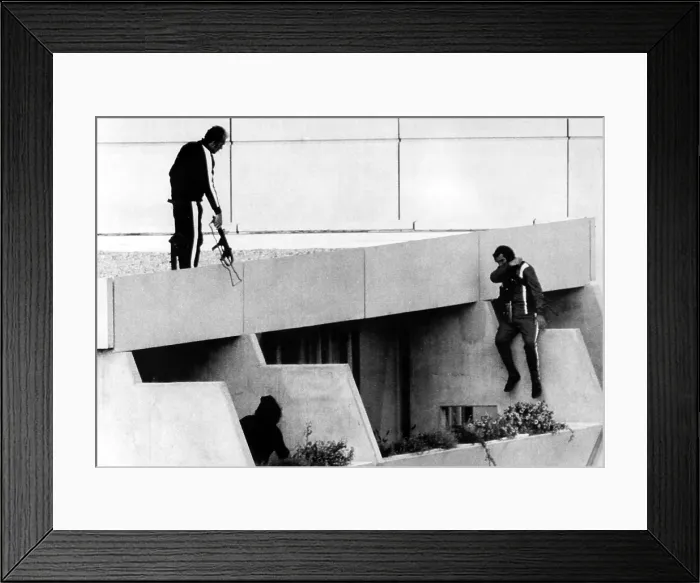 Framed Print : 1972 Olympics, Armed Police drop into position on terrace above apartments where hostages are being held. Olympic Village, Munich, Germany, 09-05-1972 Framed Print : 1972 Olympics, Armed Police drop into position on terrace above apartments where hostages are being held. Olympic Village, Munich, Germany, 09-05-1972