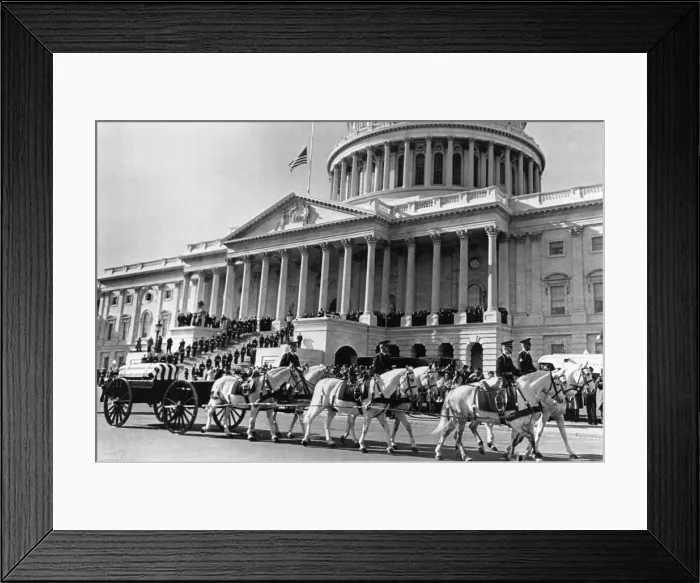 Framed Print : Horse-drawn carriages bearing remains of President John F. Kennedy after his assassination, pulling away from the Capitol to begin procession to St